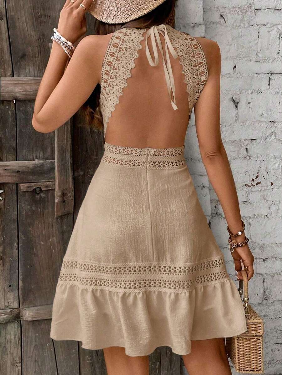 Robe dos nu à ourlet asymétrique
