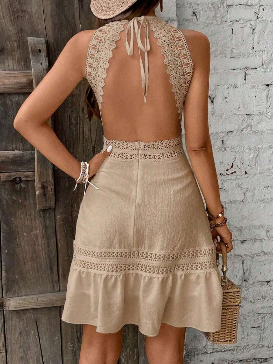 Robe dos nu à ourlet asymétrique